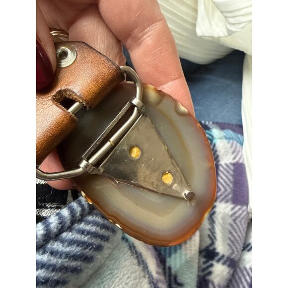 Brown leather belt cuddling couple tooled on it Brazilian agate slice buckle